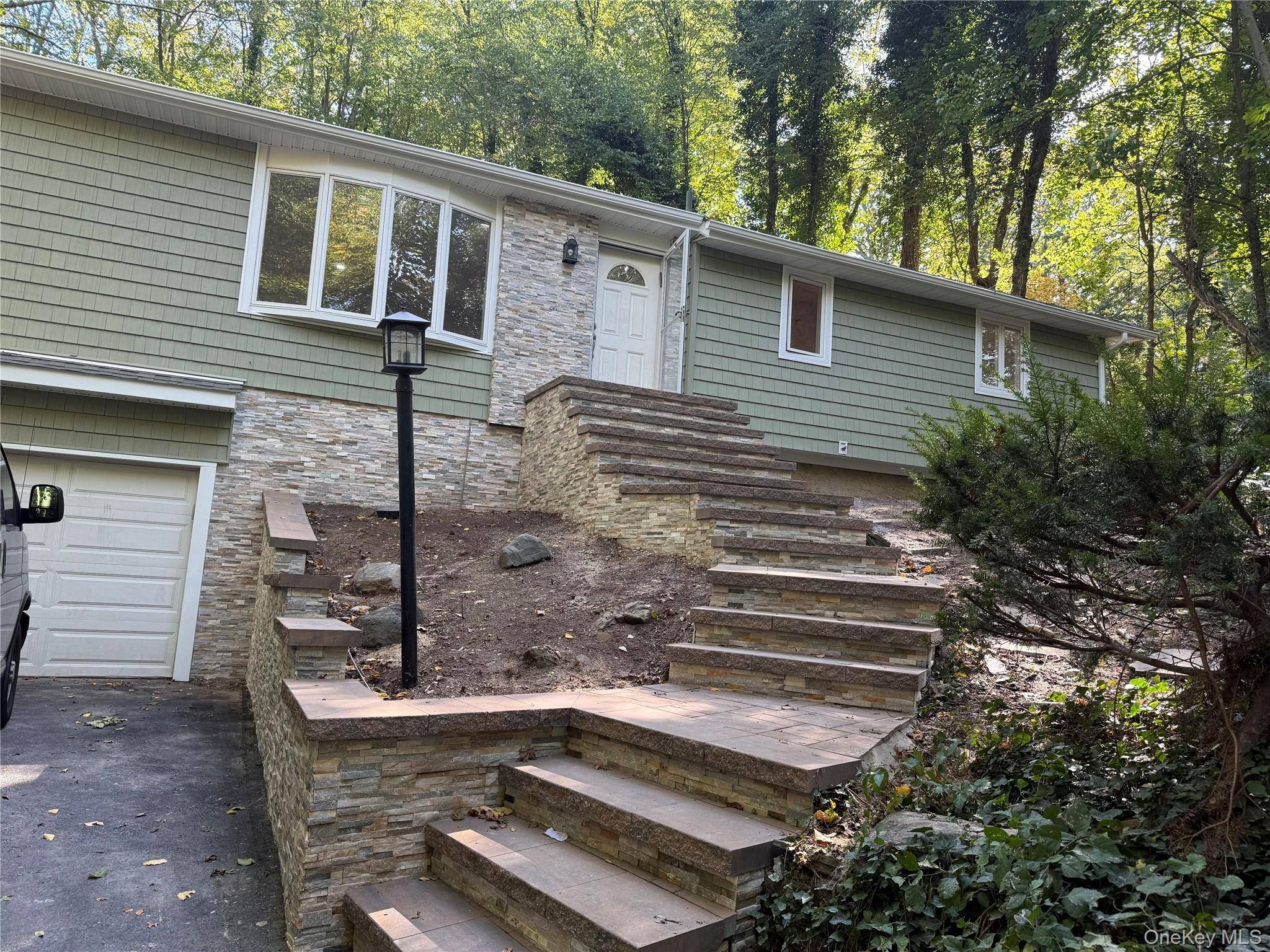 Live on Top of the World Perched high on a scenic hilltop, this exquisite 3 bedroom, 2 bath high ranch offers breathtaking views and unparalleled craftsmanship throughout.