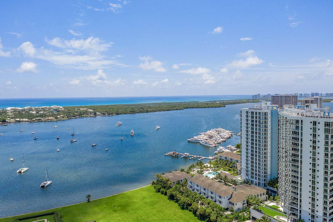 Highly desirable floor plan in Water Club offering expansive floor to ceiling water views.