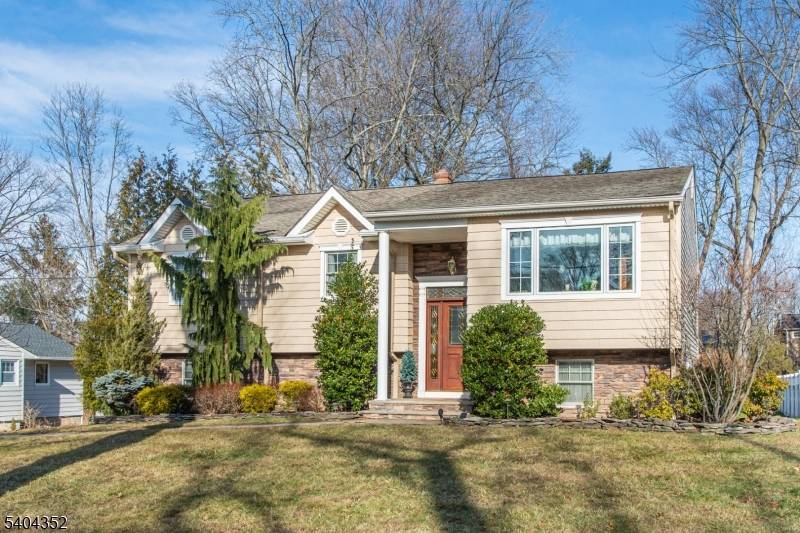 Nestled in the heart of West Caldwell, this warm and inviting home embraces a lifestyle of comfort and distinction.