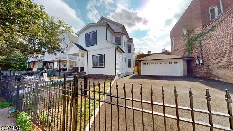 Experience luxury living in this fully renovated two family home, better than a new construction !