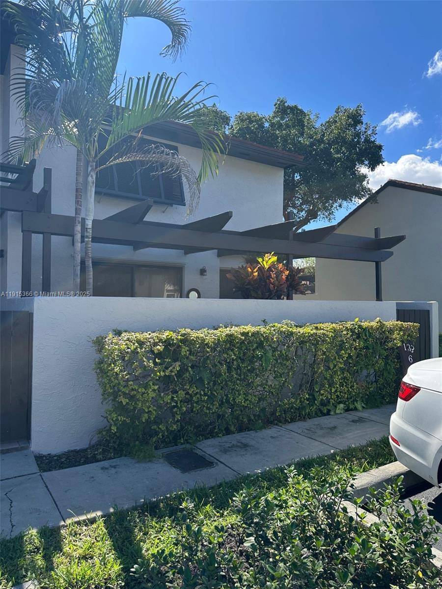 Step into this bright and spacious two story corner townhouse in the highly sought after Calusa Point of Kendall.