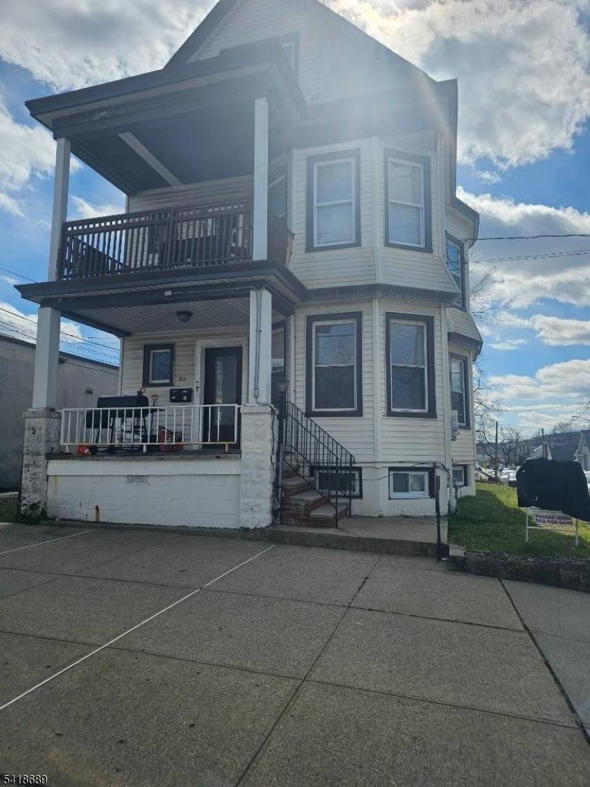 BEAUTIFUL AND GREAT INVESTMENT OR LIVE IN AND COLLECT RENT 4 FLOORS OF LIVING, FIRST FLOOR 3 BEDROOMS, LIVING ROOM, FORMAL DINING ROOM, EAT IN KITCHEN, LAUNDRY ROOM.