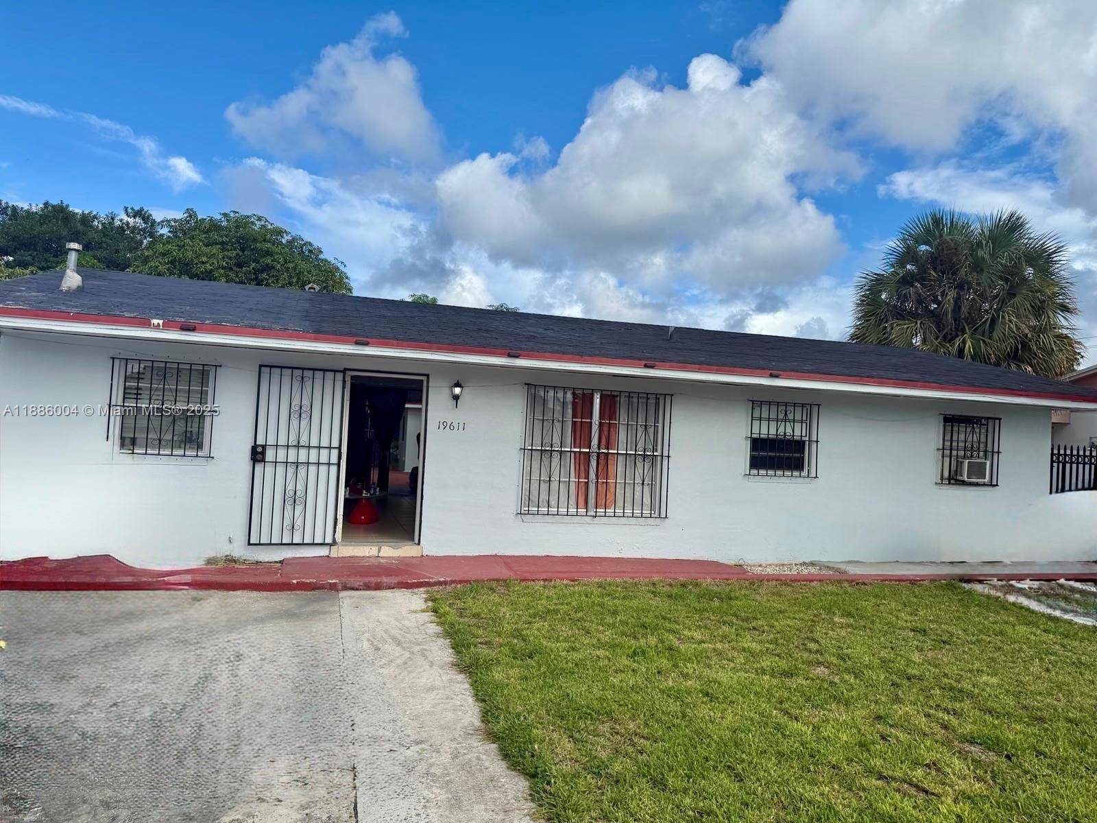 Discover a charming single family home in Miami Gardens, ready for your personal vision.