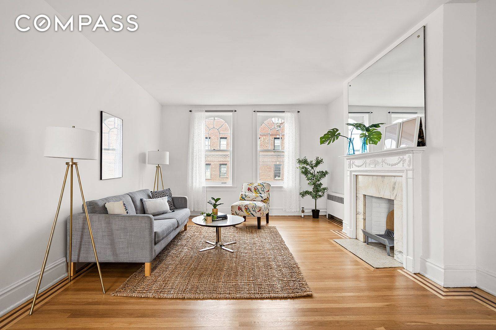 Super sunny top floor, pre war 2BR 2BA coop in coveted Hawthorne Court, the heart of the Jackson Heights Historic District.
