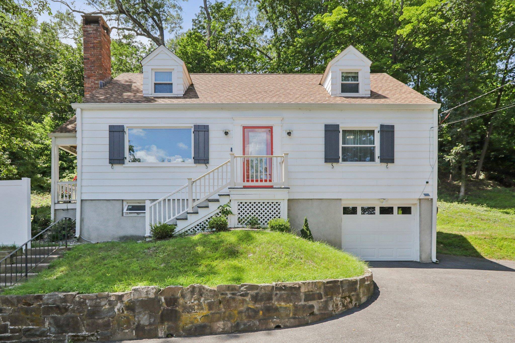 Welcome to This Charming 4 Bedroom 2 Bath Cape Cod Home, Nestled in the Serene Mountainside of Nyack NY.