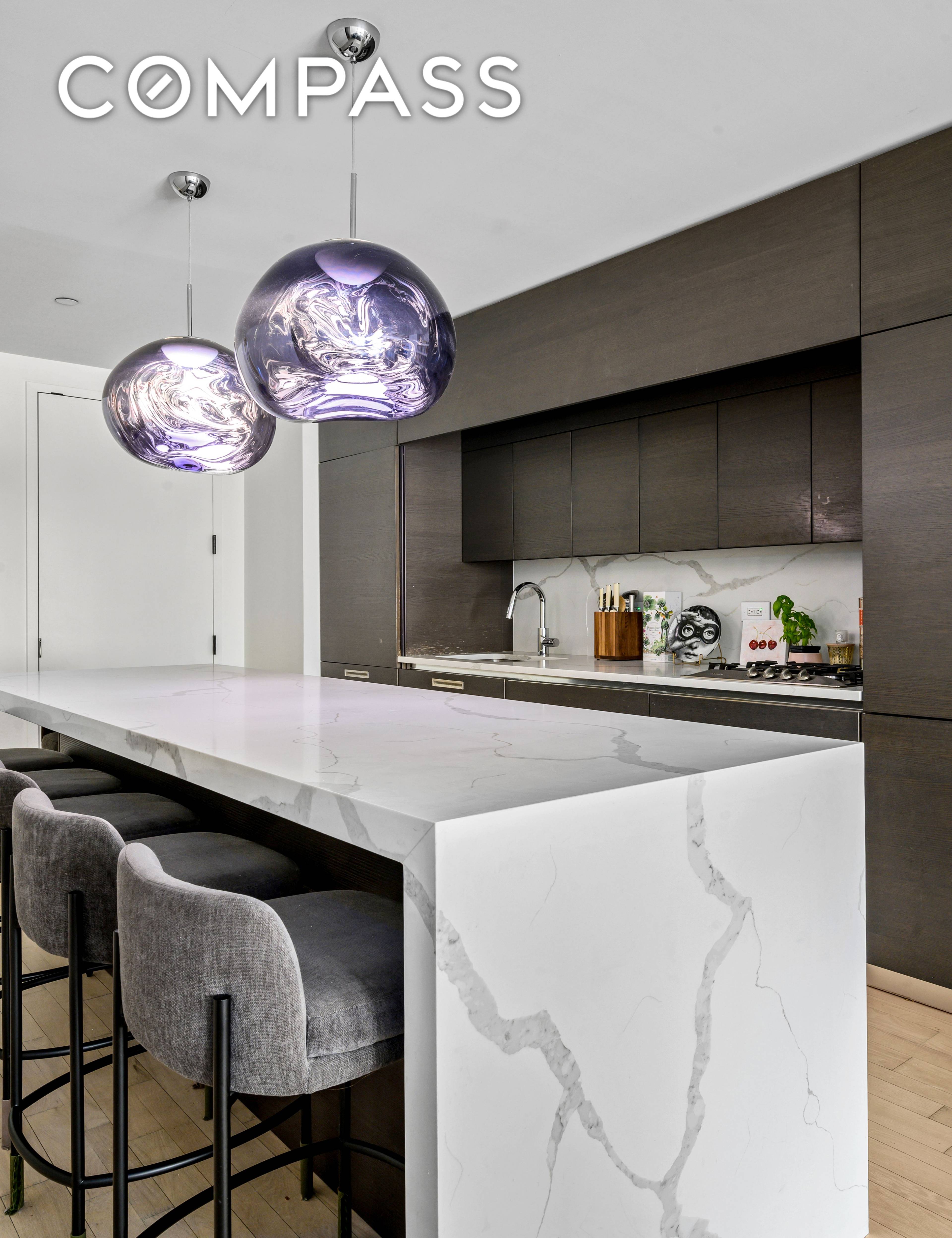 Welcome to luxury living at its finest in this stunning Armani Casa designed, 1005 ft2 residence at 20 Pine Street.