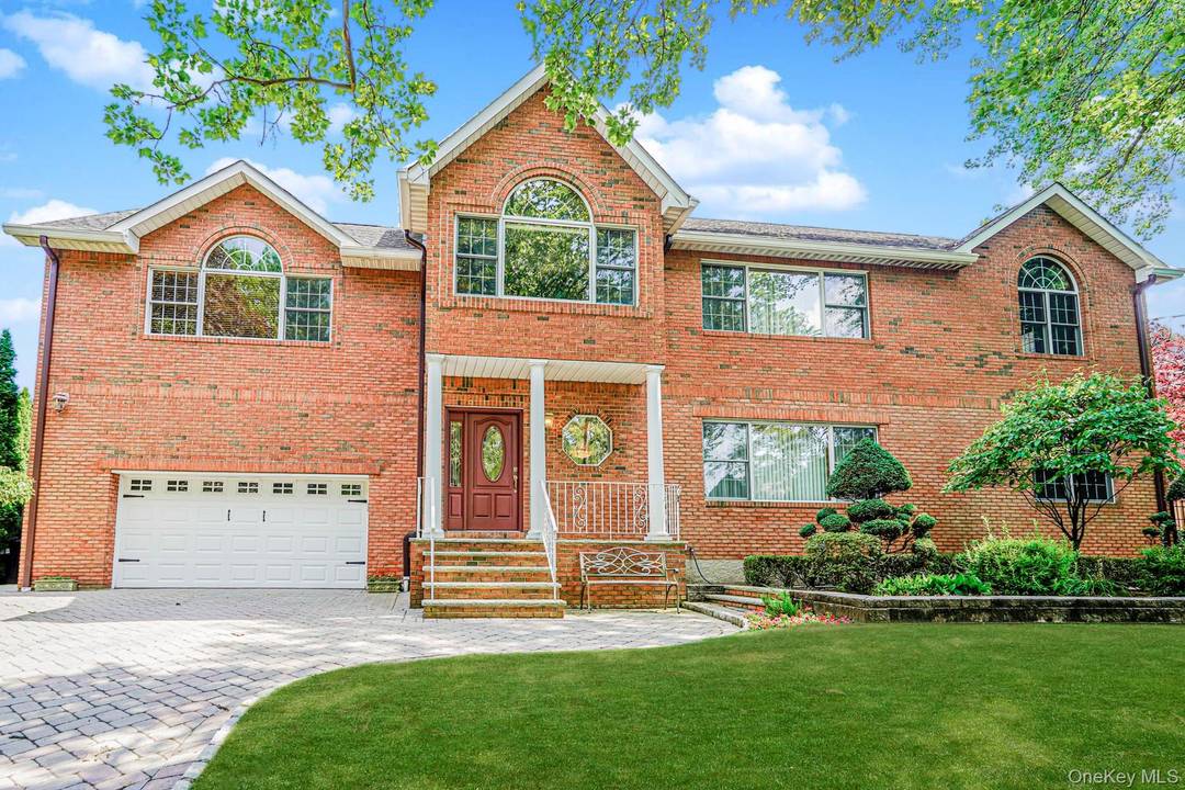 Custom All Brick Home with Resort Style Yard on a Tranquil, Tree Lined Street Nestled on a quiet, tree lined street, this expansive custom designed home offers privacy, comfort, and ...
