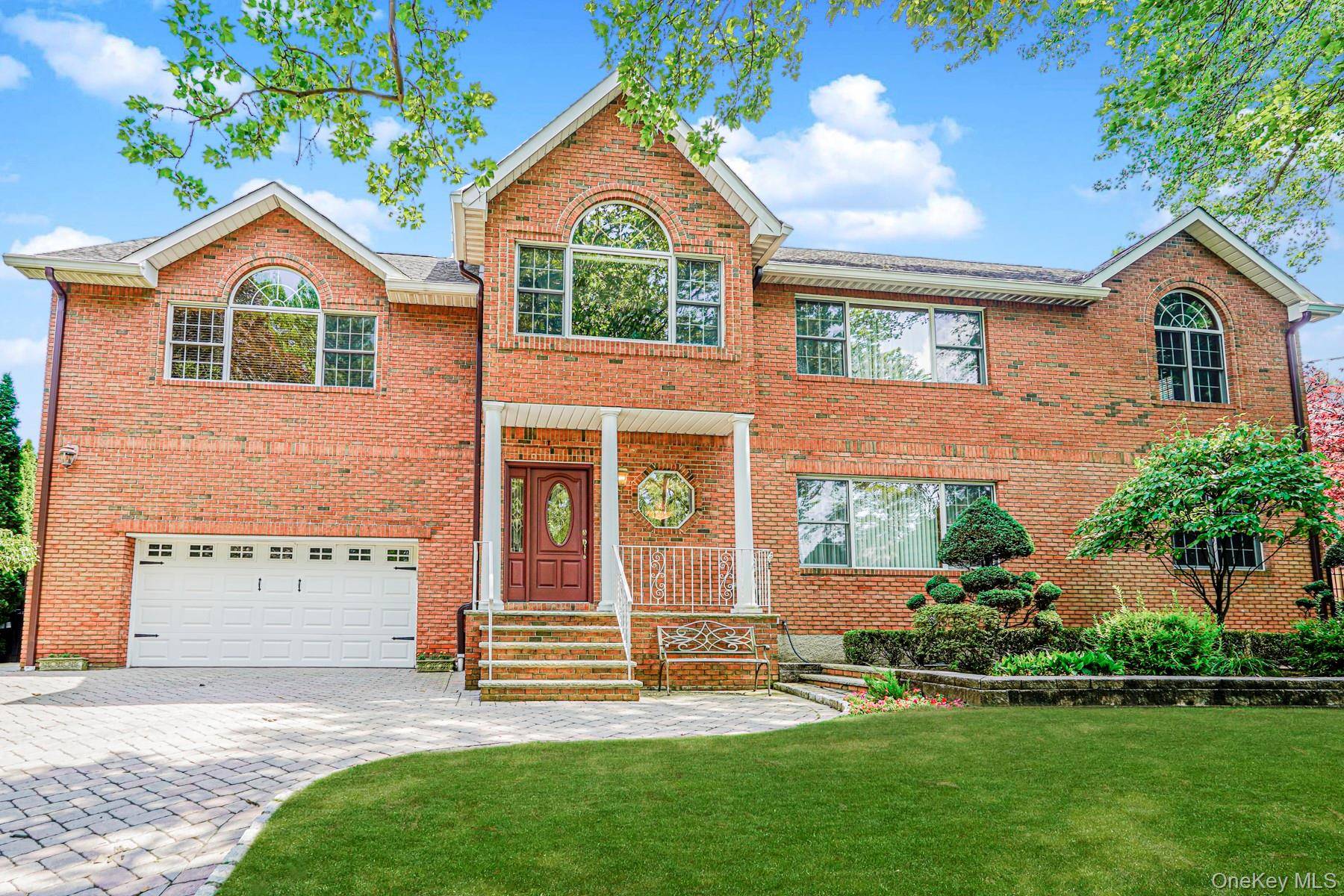 Custom All Brick Home with Resort Style Yard on a Tranquil, Tree Lined Street Nestled on a quiet, tree lined street, this expansive custom designed home offers privacy, comfort, and ...