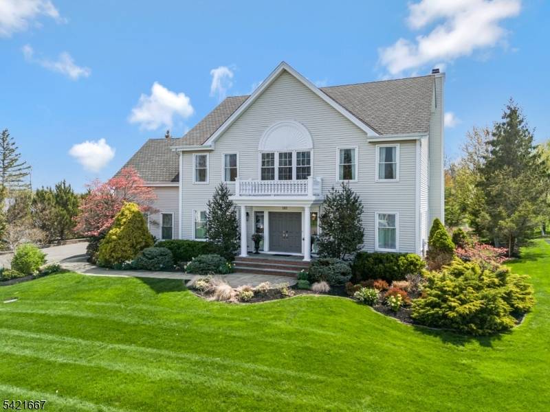 Set high on a picturesque street in one of Stony Hill's most sought after neighborhoods, this stunning home offers elegance, space, and thoughtful design throughout.