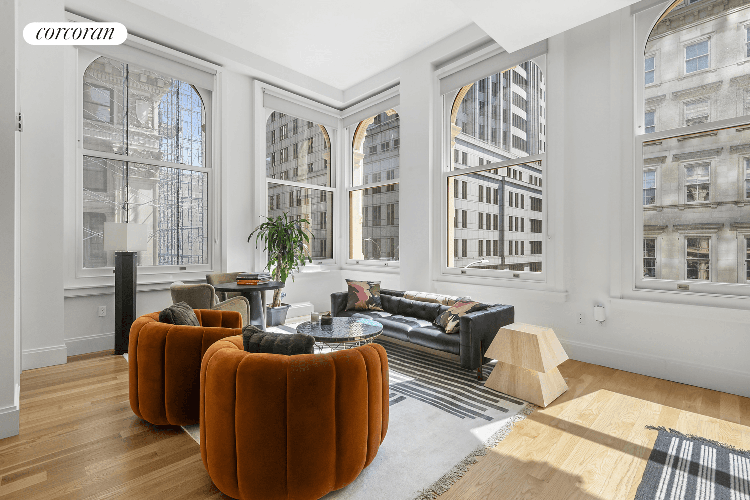 2 Bedroom 2 Bathroom LoftThis stunning apartment boasts a charming corner living and dining area adorned with 6 expansive arched windows approximately 8 feet tall.