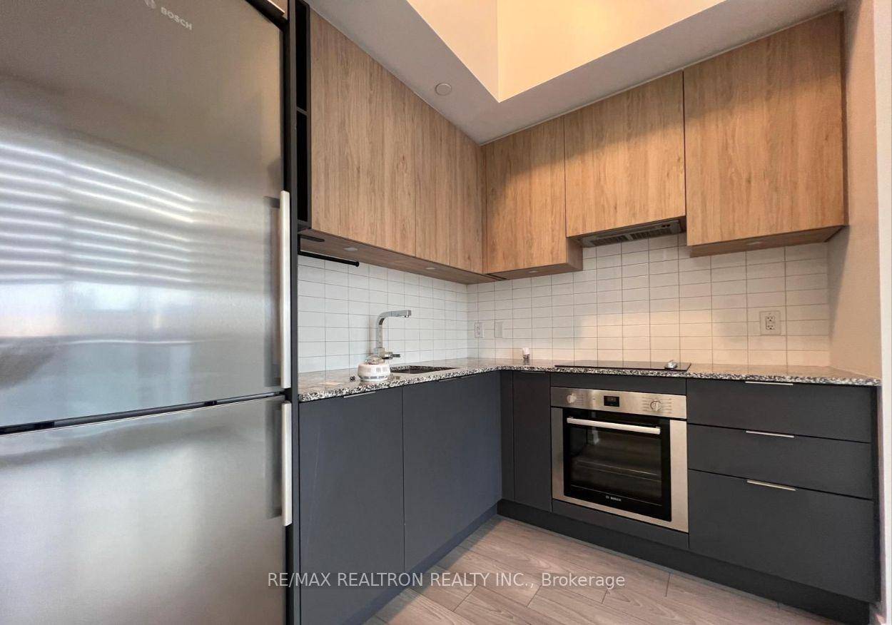 Welcome to this Modern 1 bedroom condo in the heart of Toronto's bustling East End.