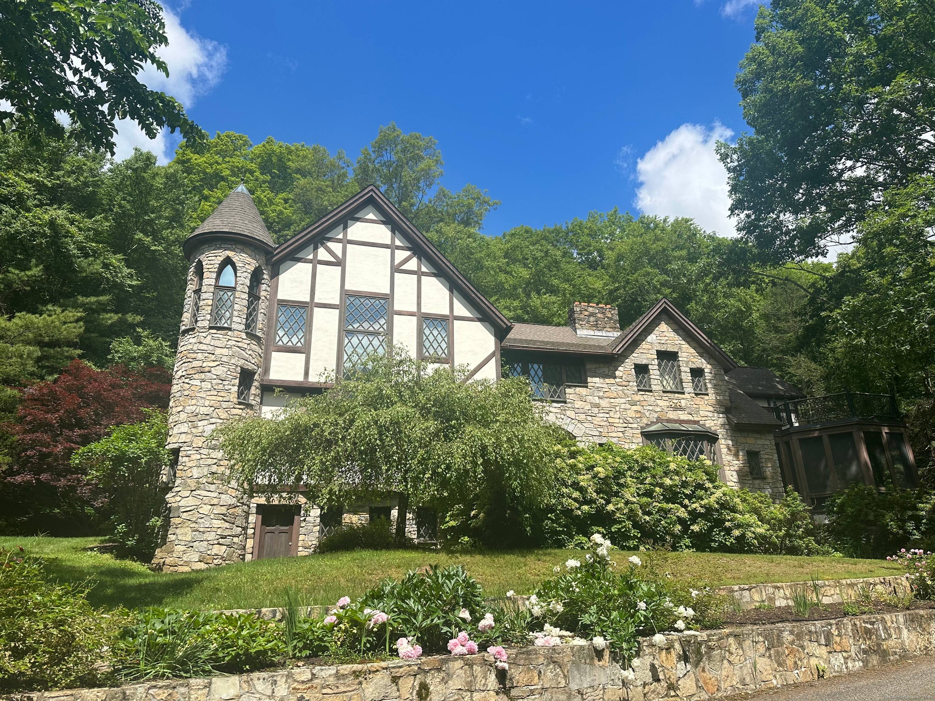 Nestled on 8 private acres with a pond, on a private road, this house is in the picturesque town of Kent, CT.