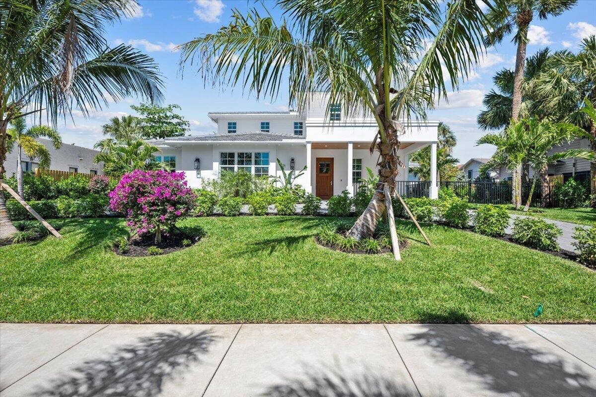 Nestled in the heart of the historic Flamingo Park neighborhood, 721 Kanuga Drive is a masterpiece of modern elegance and classic Palm Beach charm.