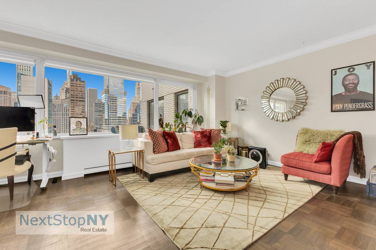 Experience sweeping city views, including Central Park vistas from your private terrace, in this rare oversized one bedroom, two bath home.