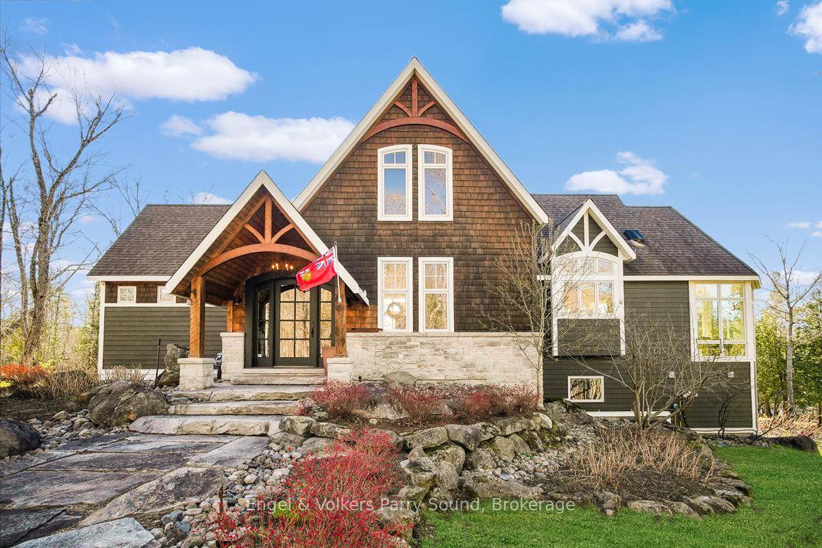 Welcome to 20 Cardinal Court, the crown jewel of Lake Manitouwabing.