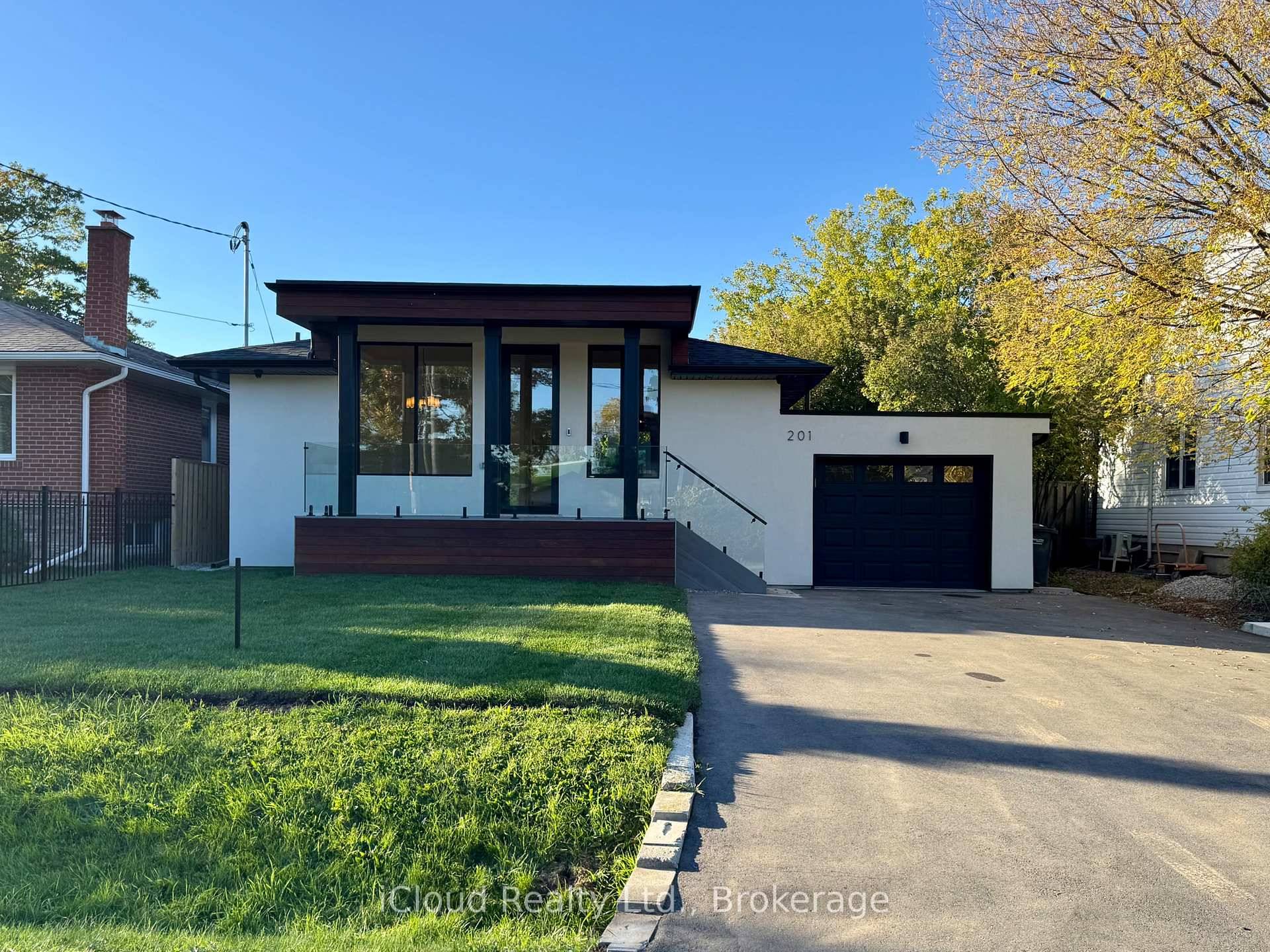 This stunning, almost brand new bungalow has been fully renovated from top to bottom with exceptional attention to detail and high end finishes throughout.