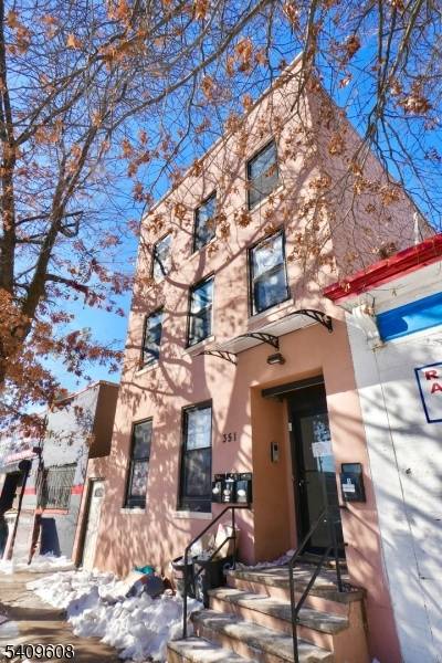 Beautifully renovated 3 family property in the heart of Newark's sought after Ironbound section.