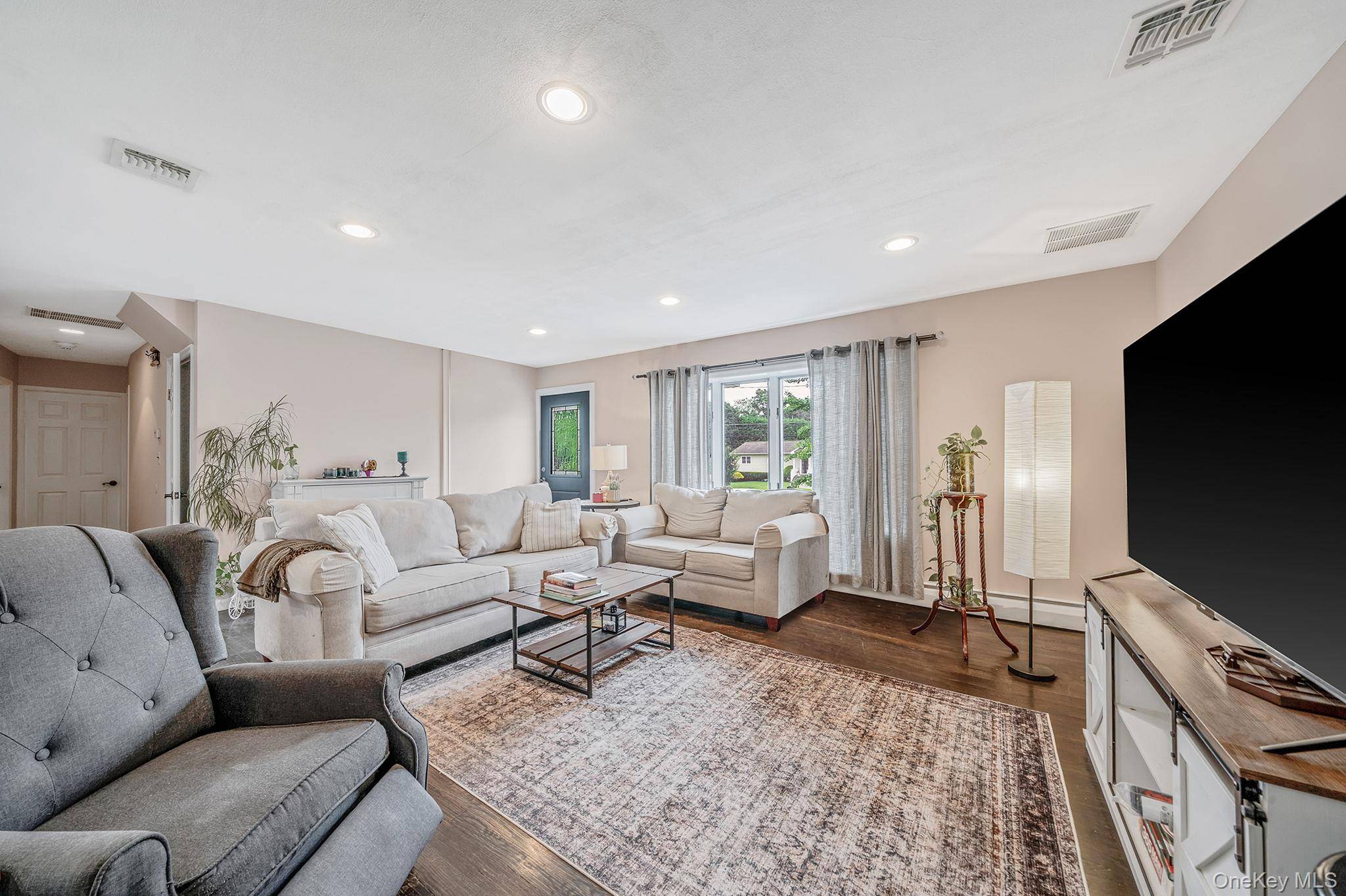 Welcome to 39 Aron Dr. This spacious expanded ranch offers an impressive 3, 800 square feet of living space, thoughtfully designed for comfort, function, and flexibility.