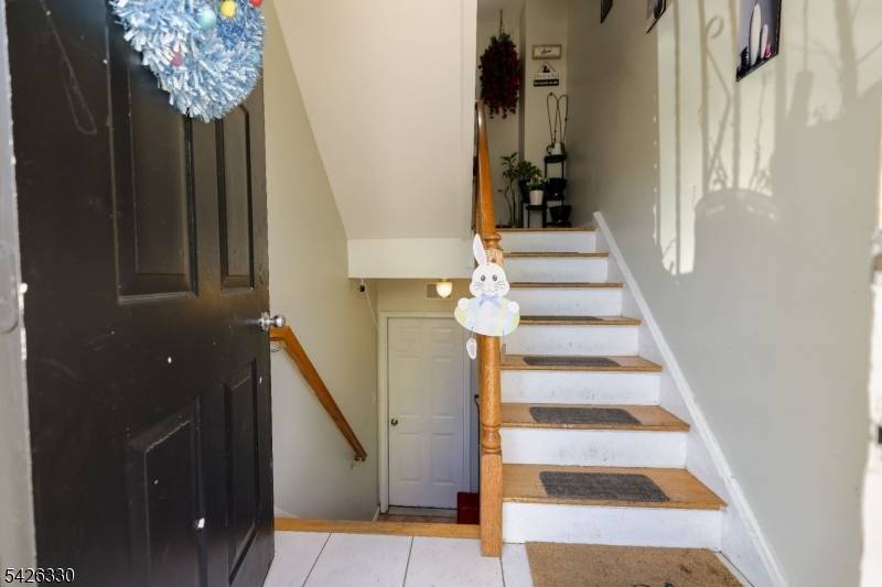 Well maintained and spacious two family home with a bonus unit.