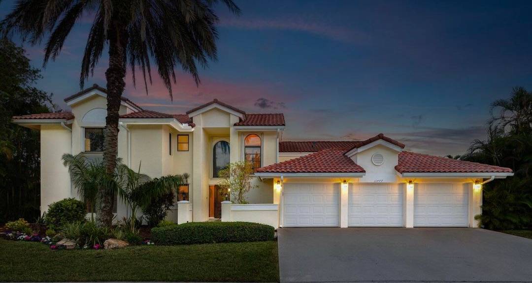 Nestled in the desirable private gated community of Island Lakes in Boca Raton, this two story single family residence features 3150SF under air, 5 bedrooms, 3.