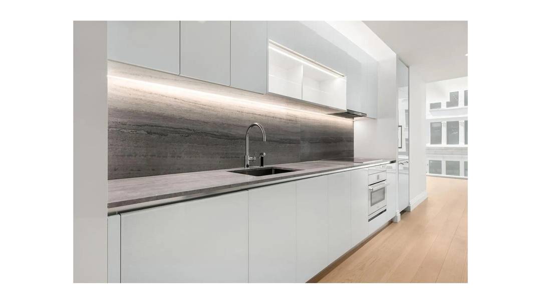 PRINTEMPS PIED A TERRE Enjoy Loft Like Living in Unit 607 and the Luxury Lifestyle that is One Wall Street !