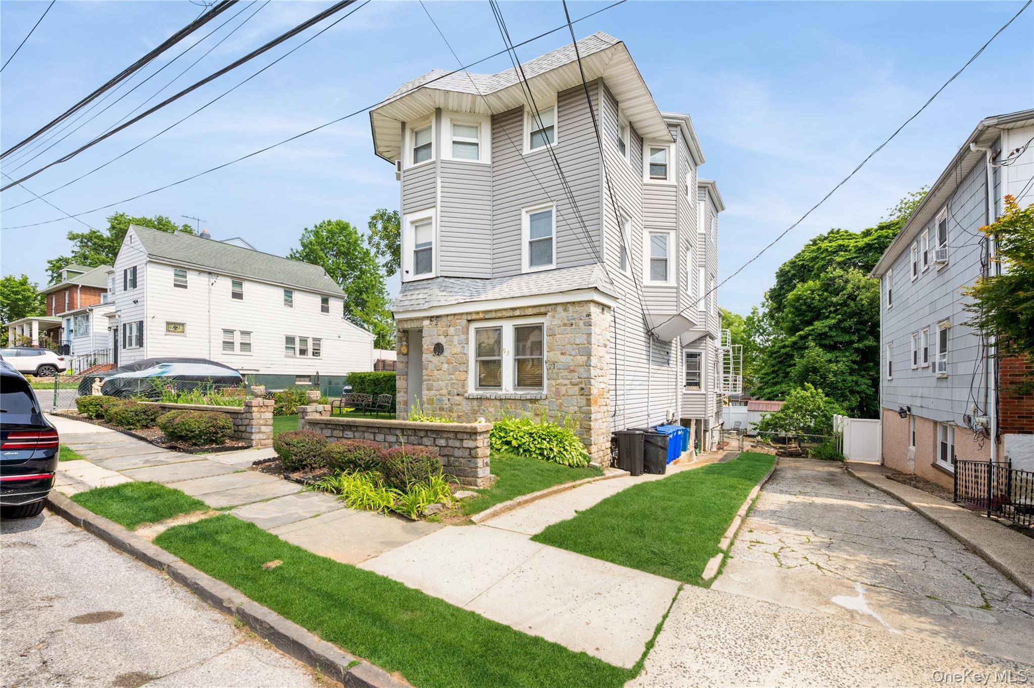 Welcome to 93 Edgewood Avenue a well maintained three family home located on a quiet residential street in the heart of Yonkers.