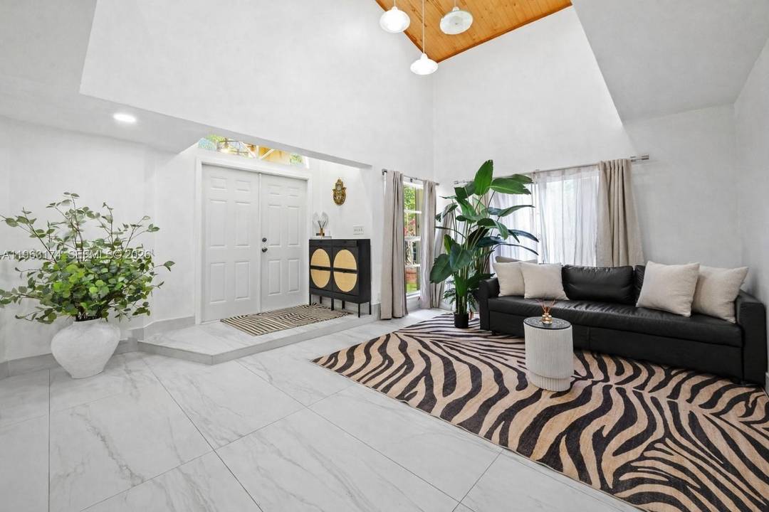 MOTIVATED SELLERS ! ! Spacious, fully updated residence in Lakes of the Meadow, one of the largest homes in the community.