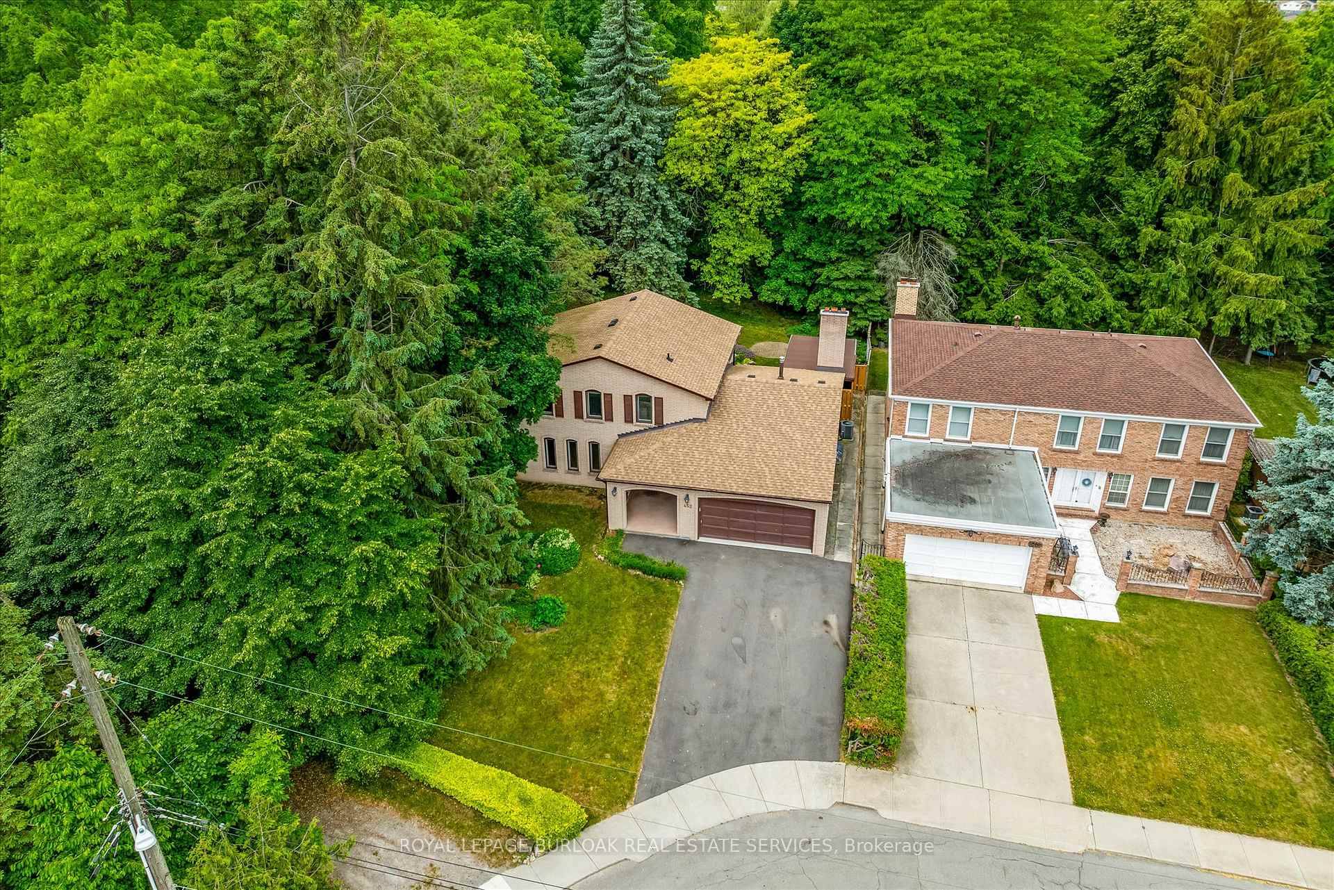 Welcome to this Lovingly Maintained Solid Family Home backing onto RAVINE and hugging the Forested Niagara Escarpment.