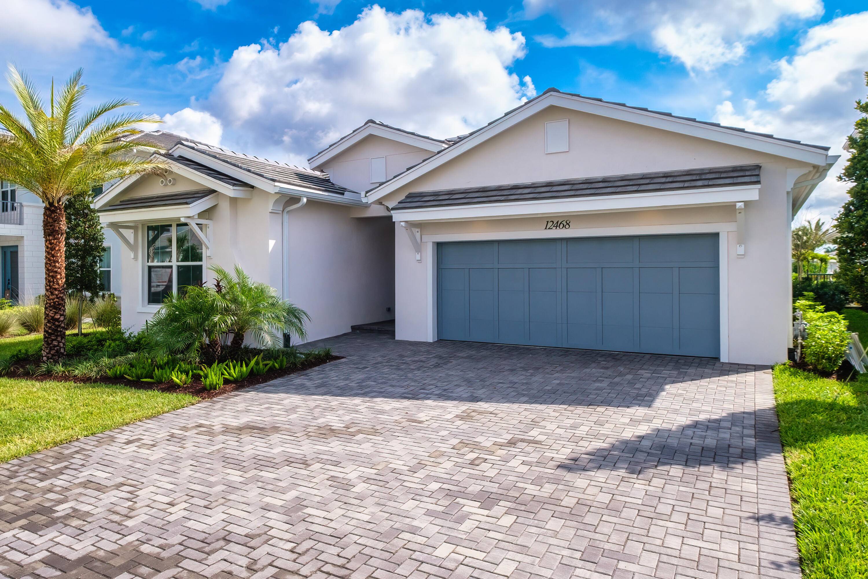 Located within the new master planned community of Avenir, this recently constructed Toll Brothers 4 bedroom home boasts numerous upgrades, including modern large format high gloss porcelain flooring throughout, 16' ...