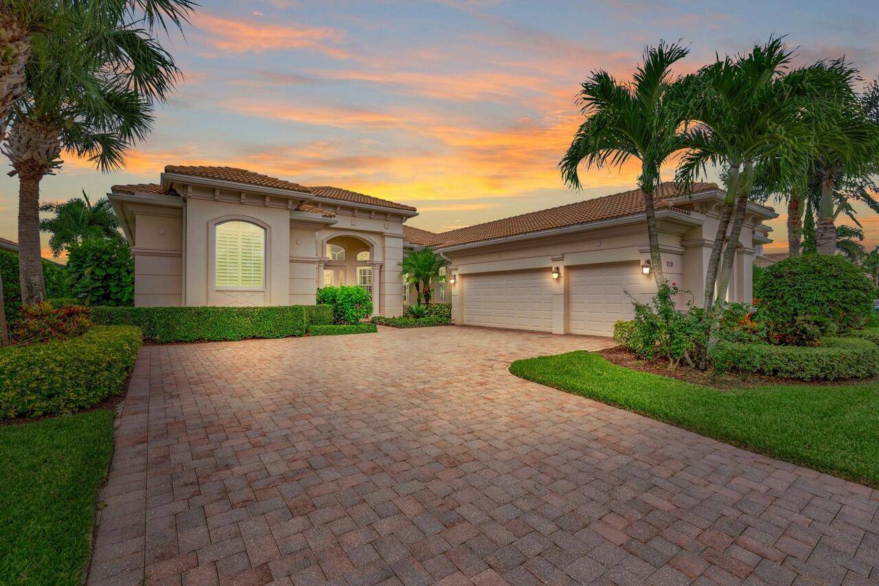 Welcome home to this immaculate 4 bedroom, 4 Bath, one story expanded Castania model in the prestigious Jupiter Country Club.