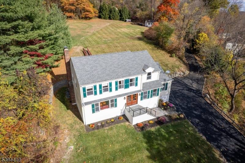 Welcome home to this charming Colonial perched on a peaceful hilltop with beautiful views of the rolling countryside.
