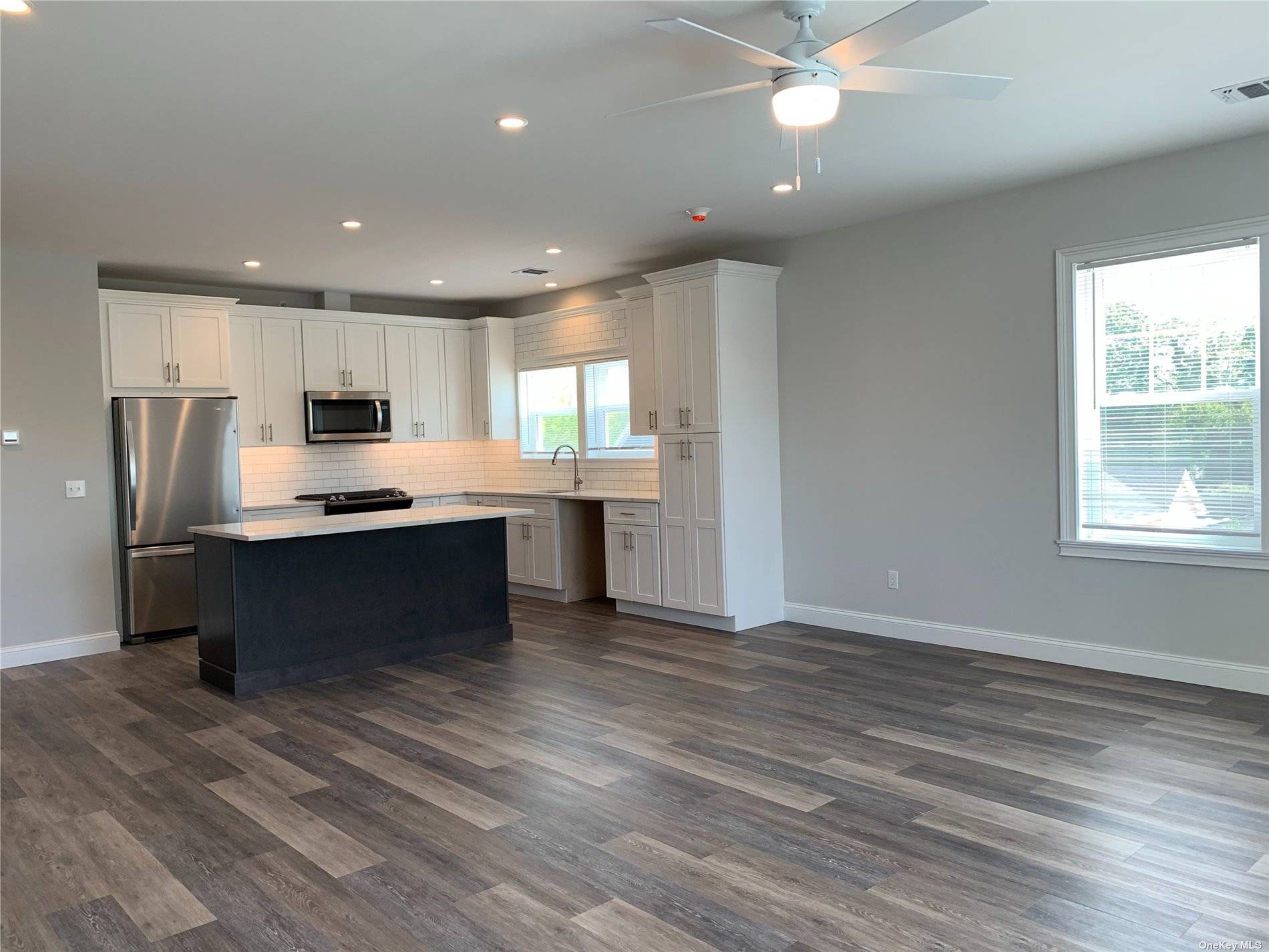 Welcome Home to This Brand New Contemporary Boutique Style Building.