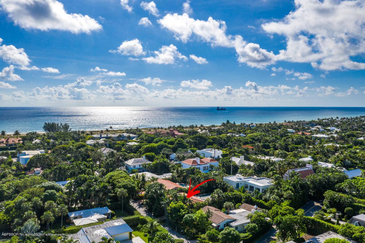 An enchanted, private oasis on the tranquil North End, featuring four bedrooms, two and a half baths and coveted beach access.