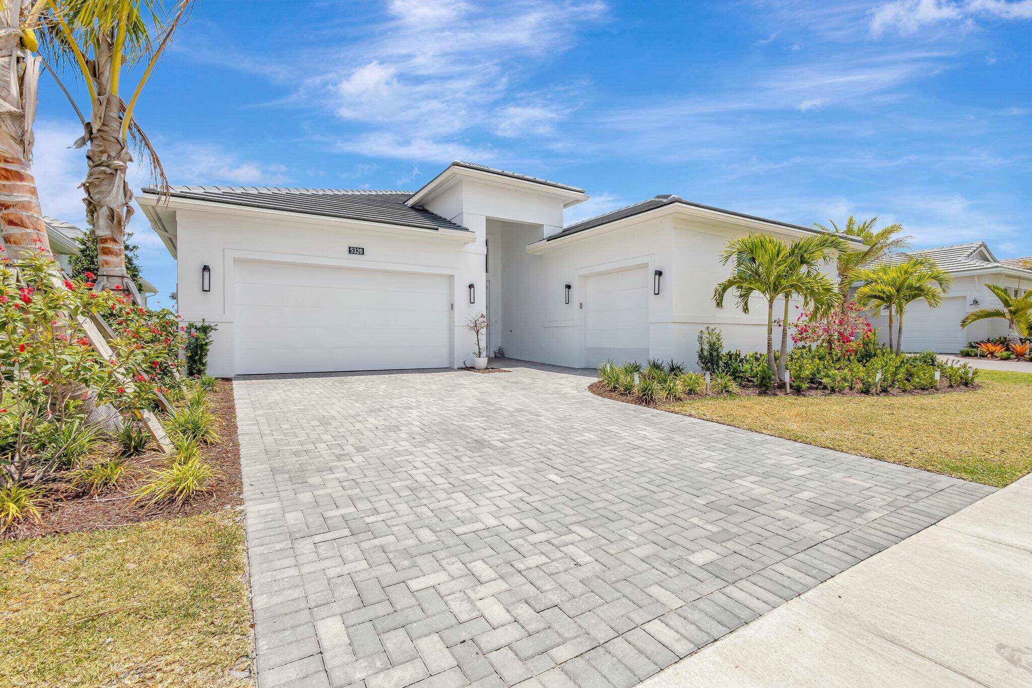 Stunning and highly upgraded Sydney model in the sought after Cresswind Palm Beach active adult community !