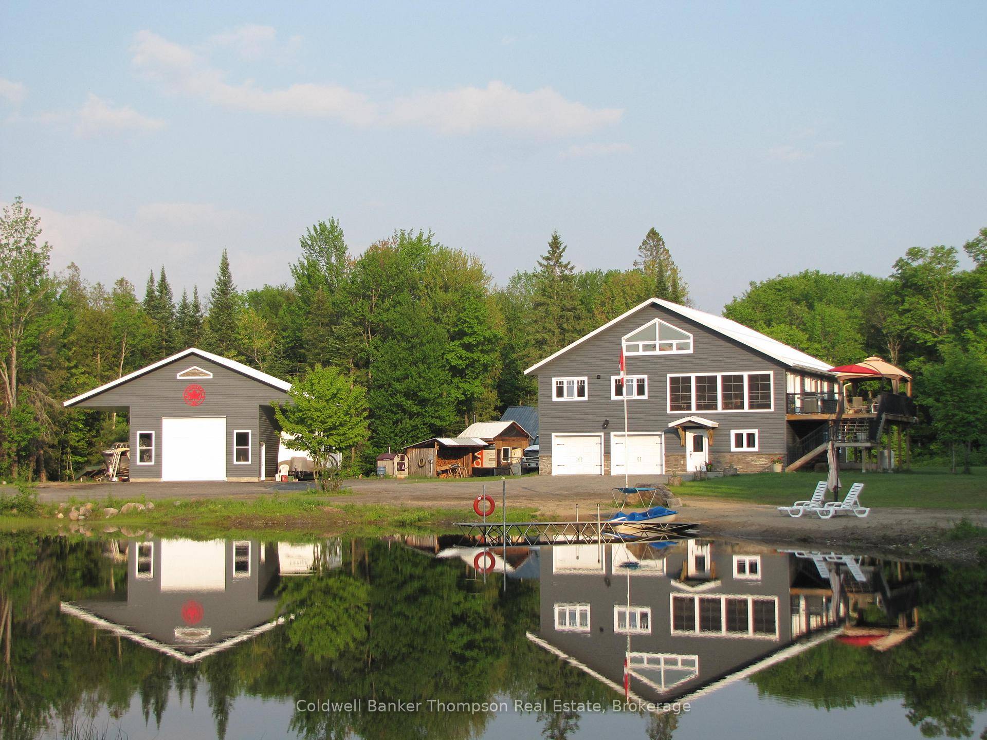 NOW HOOKED UP TO HYDRO ! This truly unique north Muskoka living experience boasts 24 acres complete with a beautiful 12' deep spring fed pond amp ; sandy beach area ...