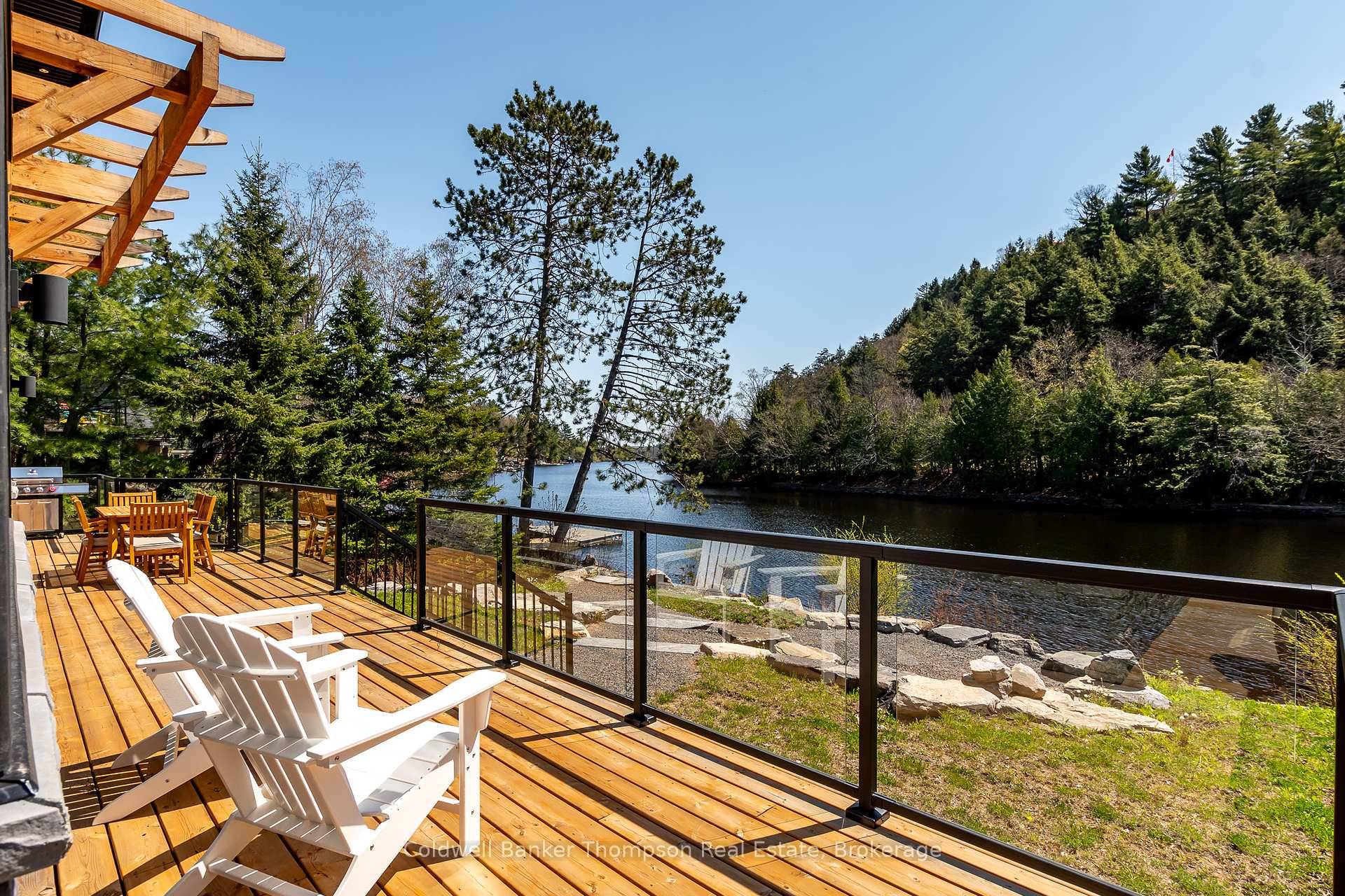 Absolutely impeccable 2023 build in downtown Huntsville, situated on the Muskoka river near the mouth of Fairy Lake.