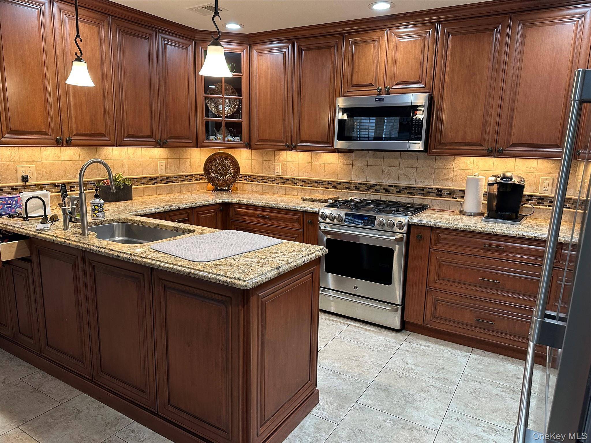 Welcome Home ! This two story townhouse is nestled in a gated community.