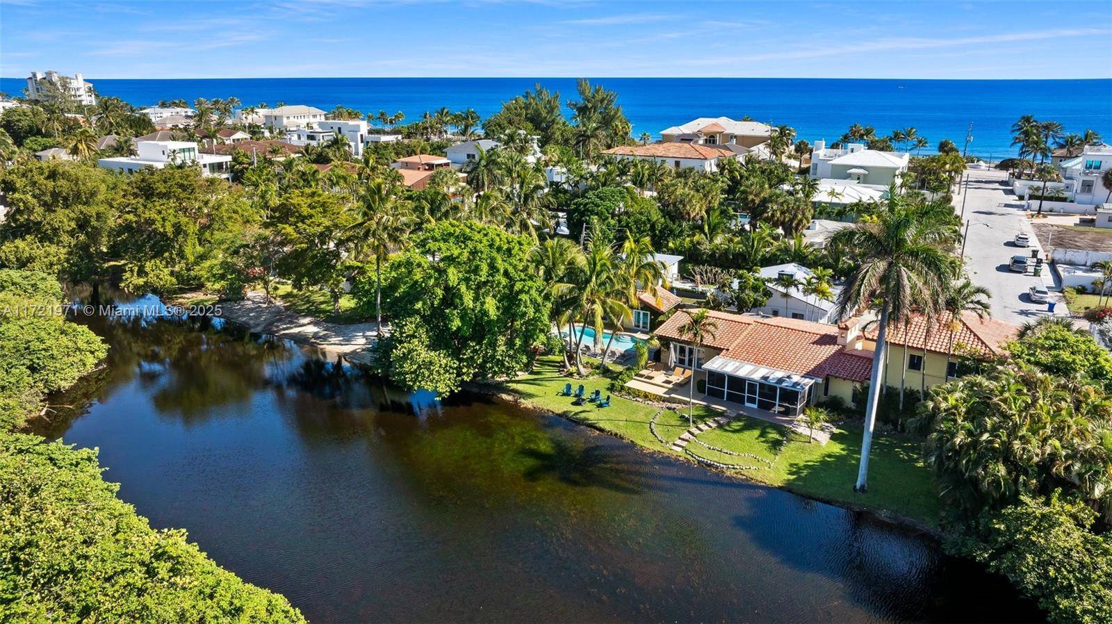 Tucked away in an exclusive beach neighborhood, this beach home is one of just 18 homes directly on Birch State Park s pristine freshwater lagoon.