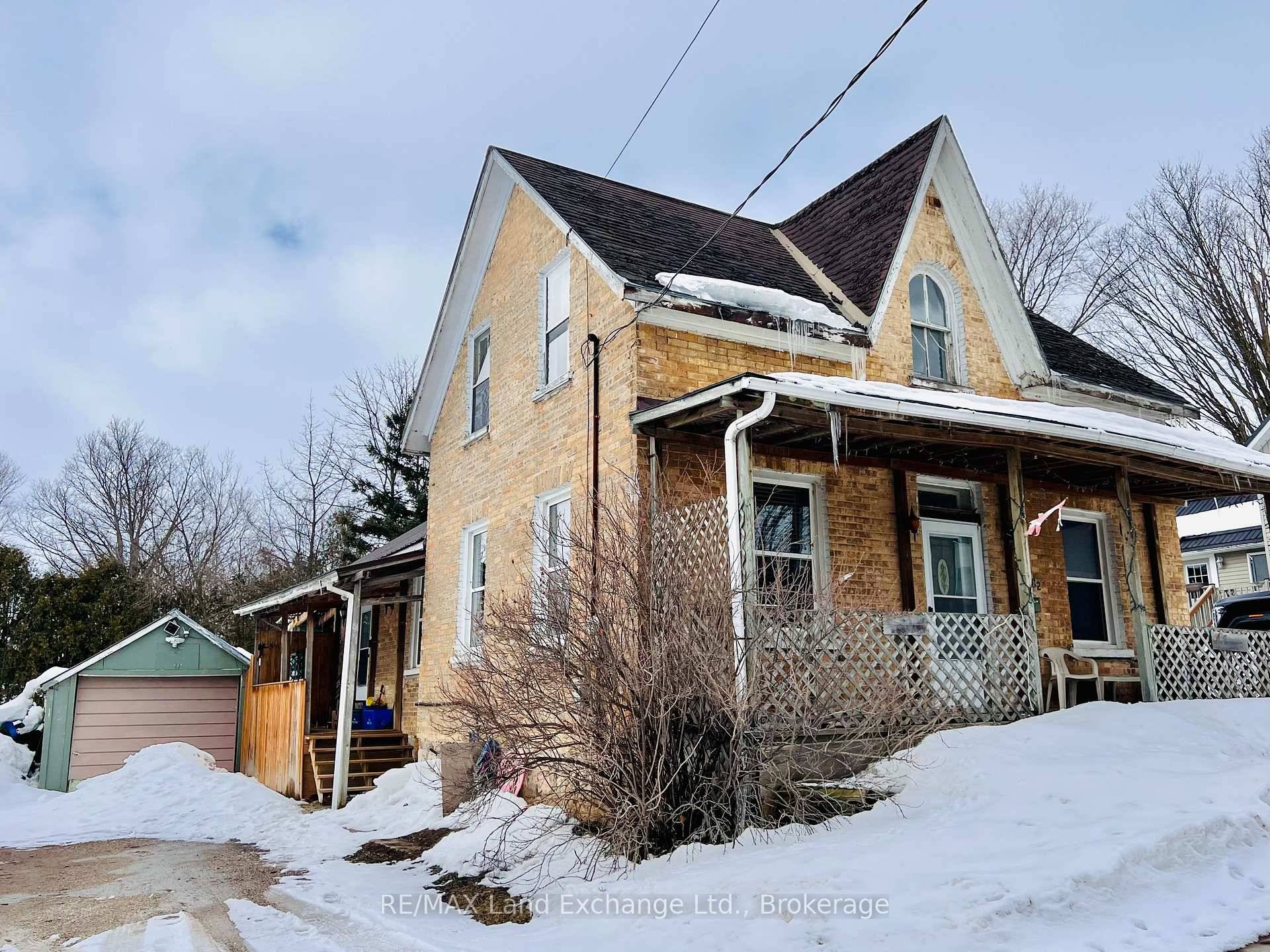 NEW PRICE ! This charming century home boasts a solid all brick exterior, standing strong and straight with timeless character.