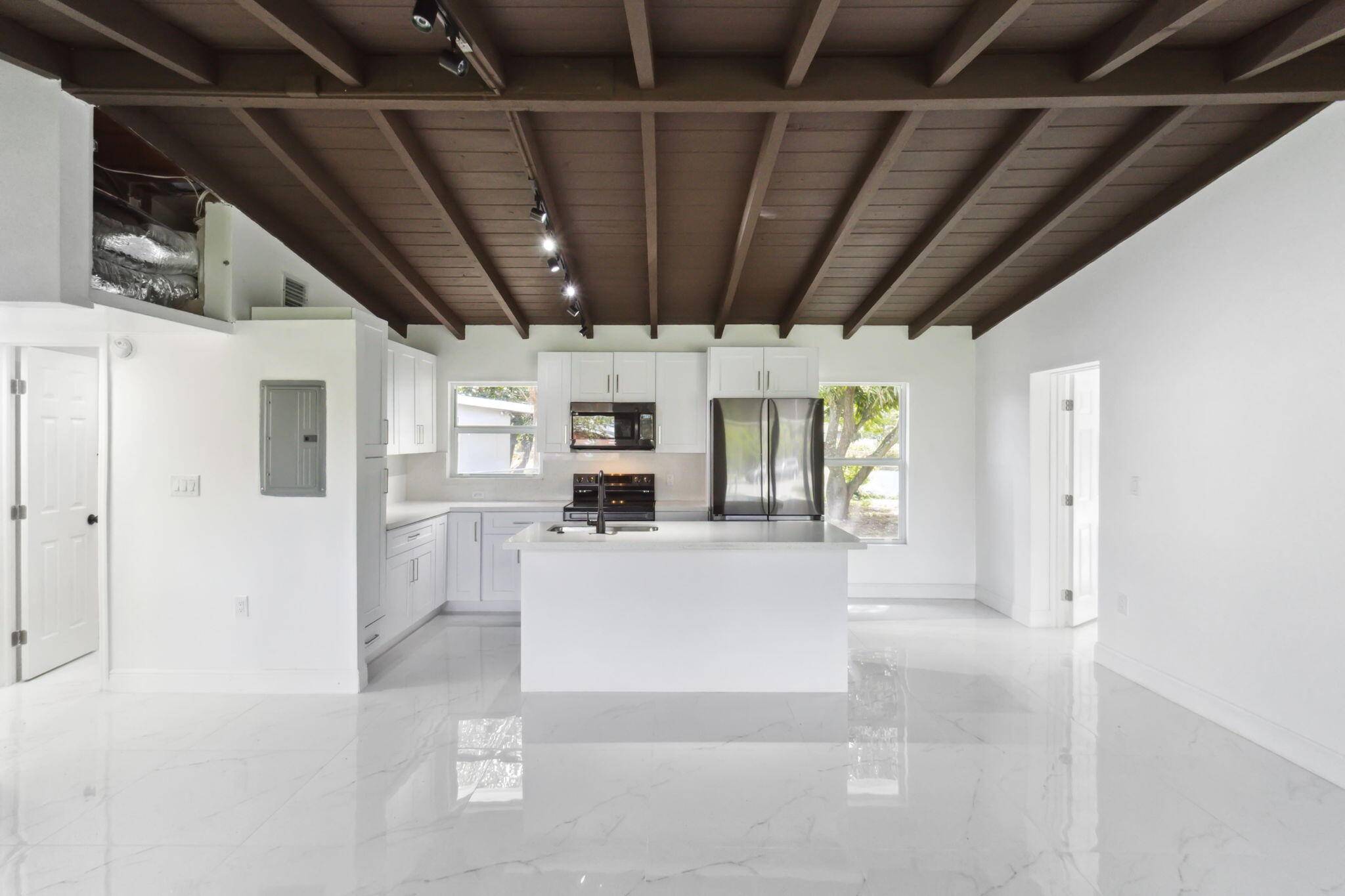 Welcome to this meticulously renovated 3 bed, 2 bath residence where every detail has been thoughtfully crafted.