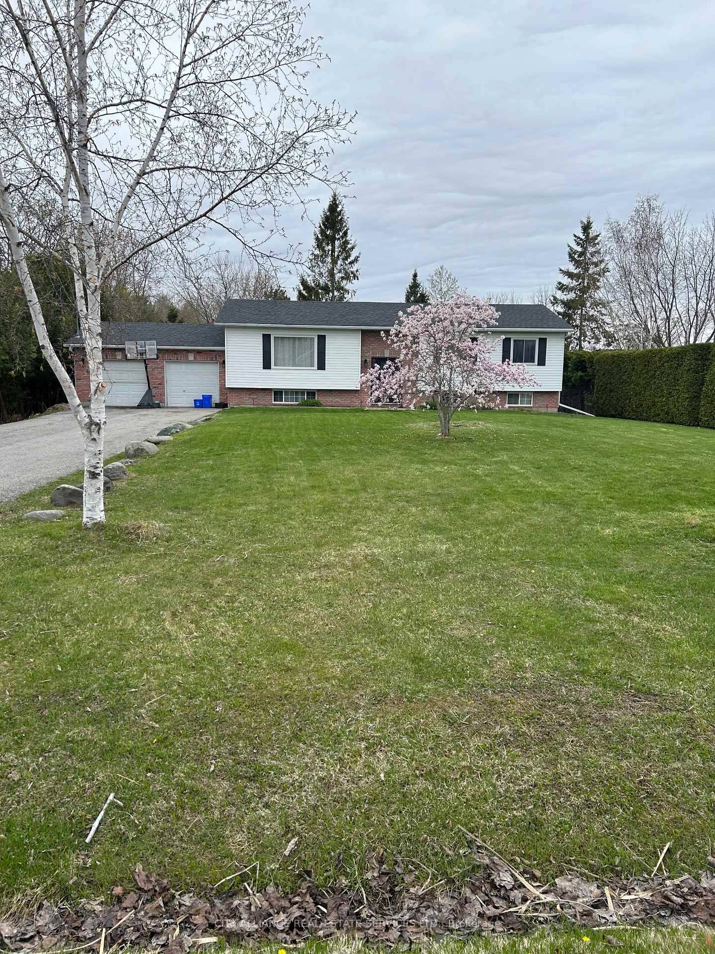 Charming 3 3 bedroom raised bungalow on a large lot just steps to Willow Beach.