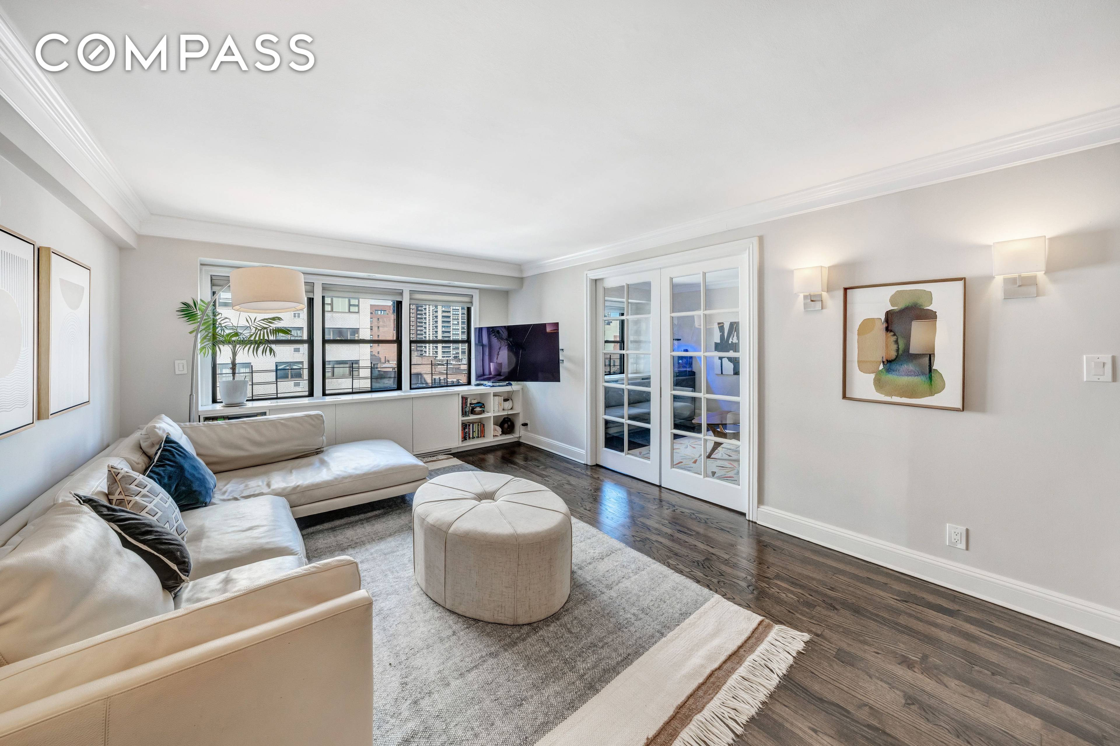 The residence at 411 East 57th Street, 11AB, is a beautifully renovated three bedroom, three bathroom home with exceptional features and abundant light.