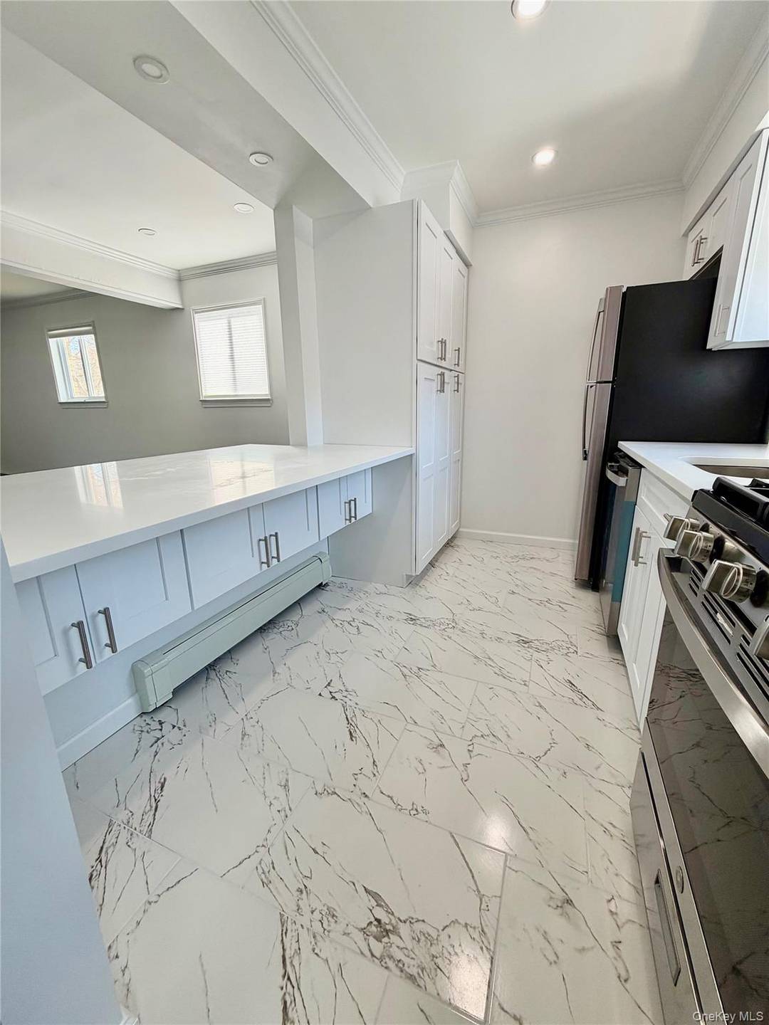 Welcome to 12 Central Drive Unit 1, a beautifully renovated 3 bedroom townhouse at the St.