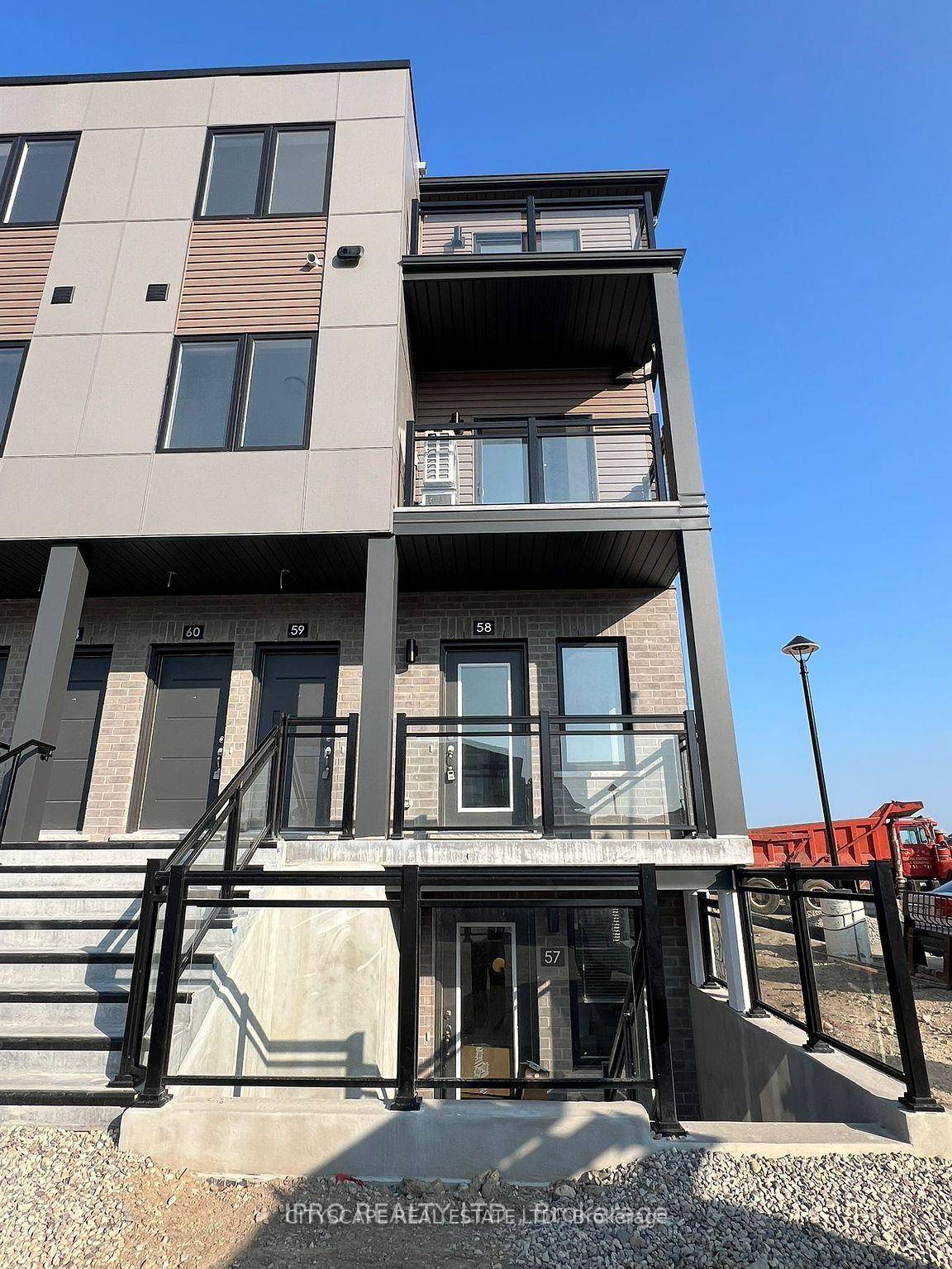 Brand new open concept 800 square foot two bedroom two bedroom main level of three story townhouse.