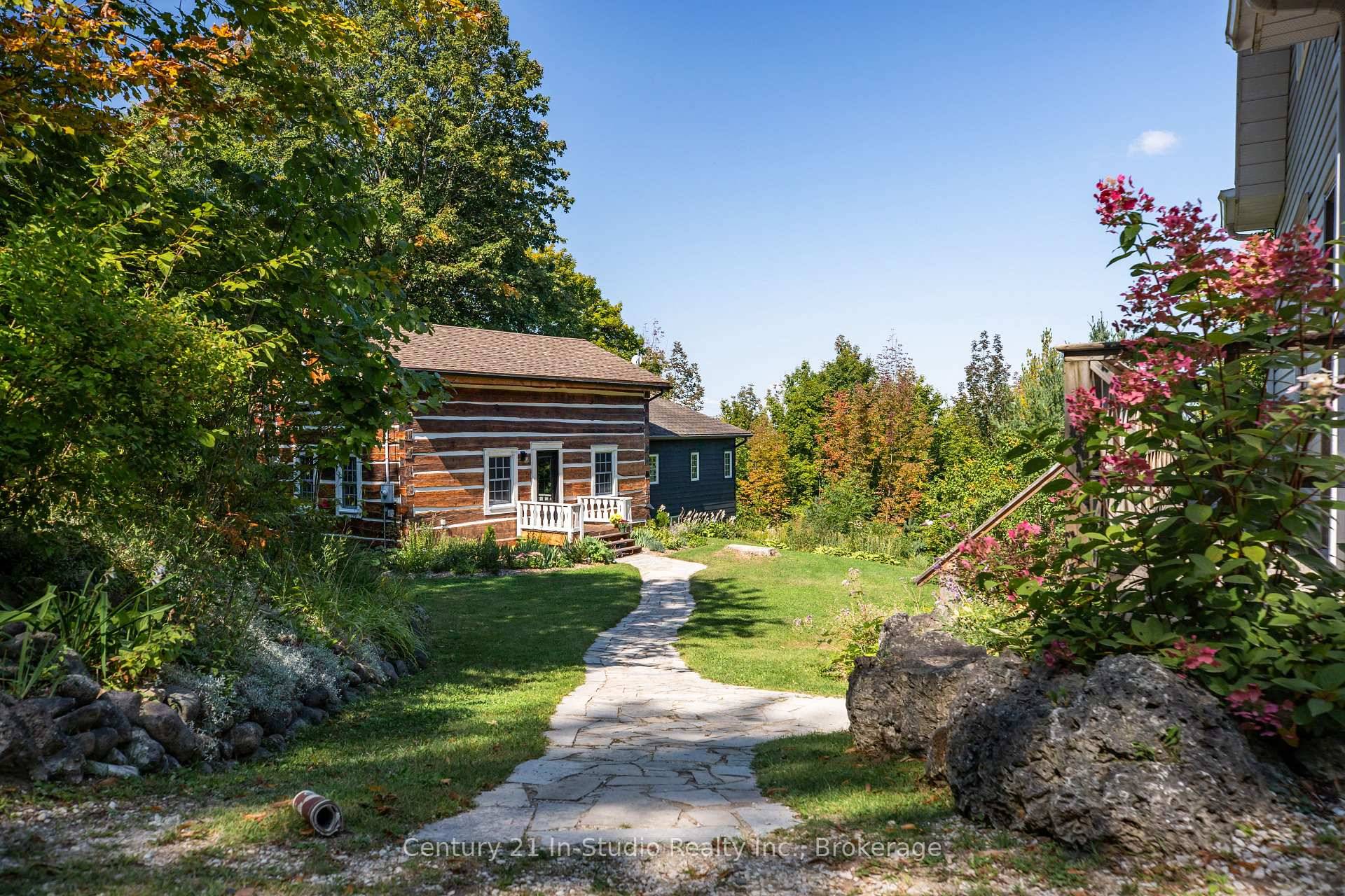 Tucked away on 16. 1 peaceful acres near the 450 acre Allan Park Conservation Area, this updated log home with a modern addition combines rustic charm with contemporary comfort.