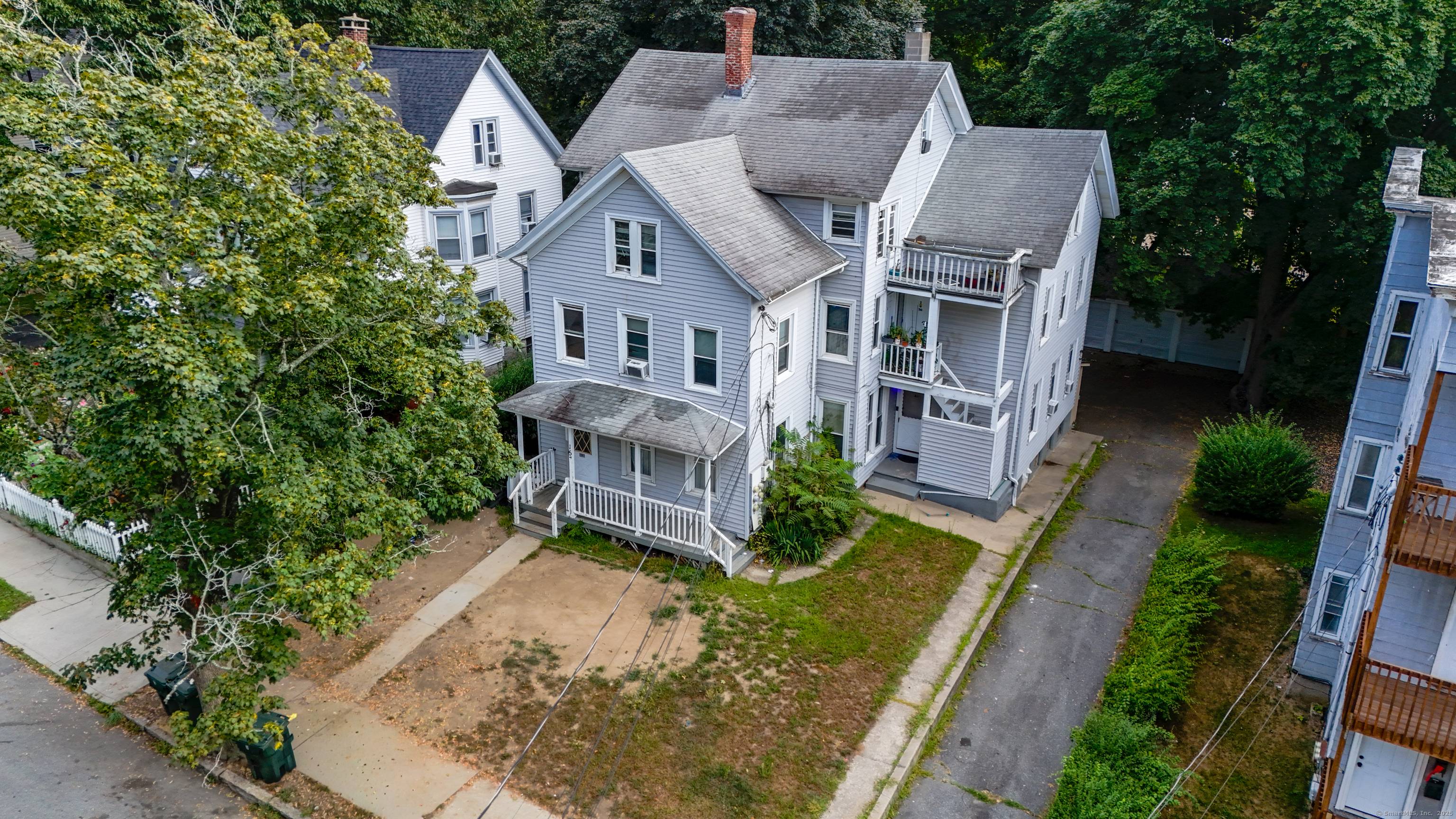 Situated in the New London Opportunity Zone, this zoned Five Family offers great value add investment.
