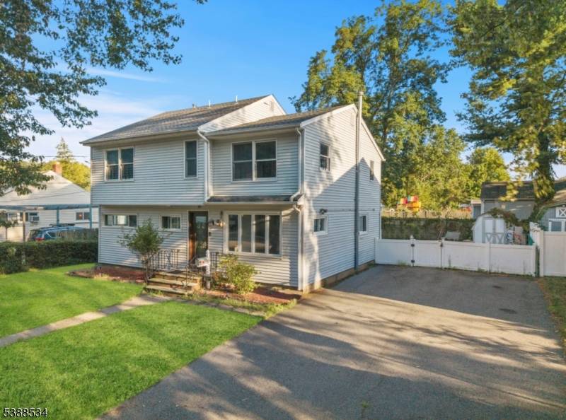 Welcome to 136 Haroldson Place, a spacious five bedroom, three bath home located in the heart of Pompton Lakes.