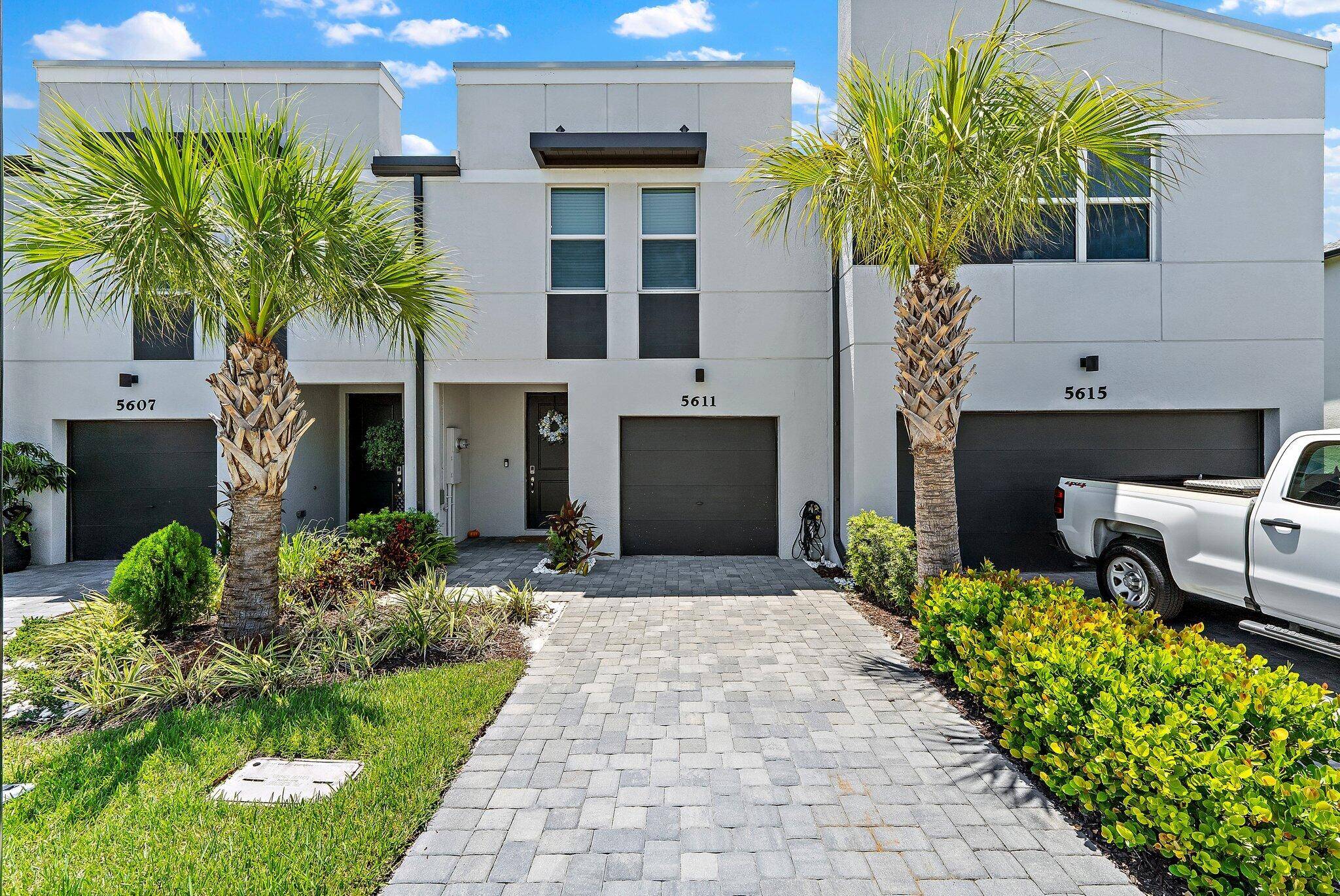 Don't miss out on this stunning, brand new townhome just minutes from the heart of West Palm Beach.