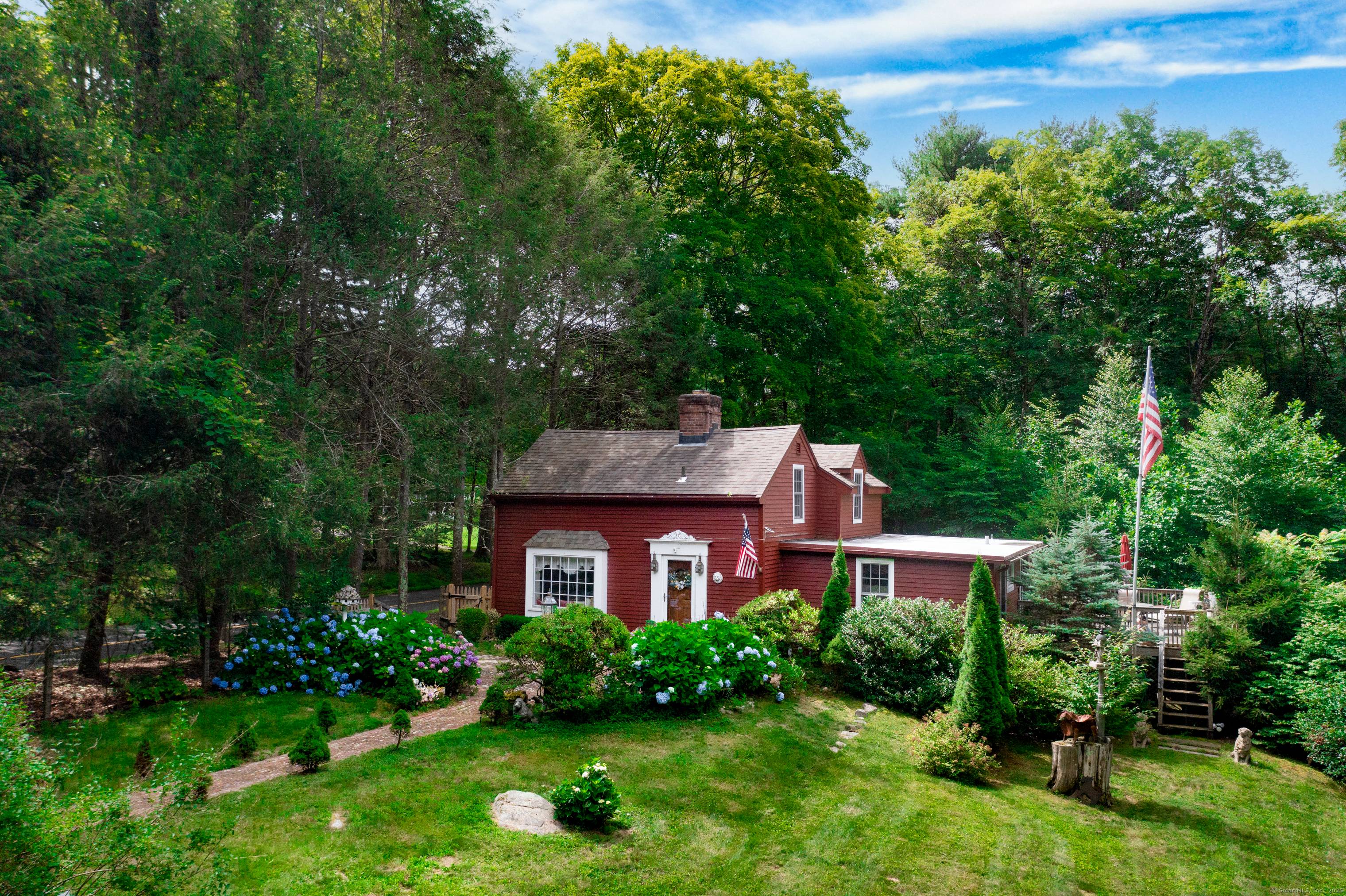 Antique 3 bedroom home on 1 acre lot in Killingworth, surrounded on three sides by state land and a lovely babbling brook.