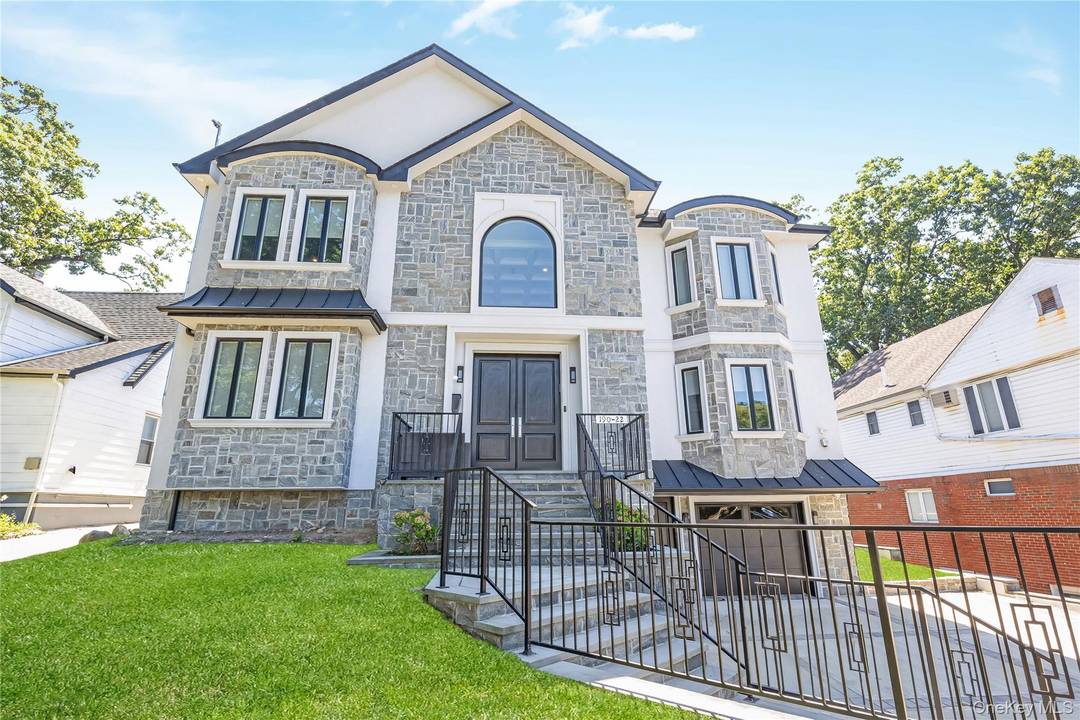 Welcome to this stunning newly constructed five bedroom, 4 1 2 bath colonial home located in the prestigious neighborhood of Holliswood.